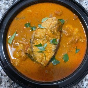 Kingfish cooked with coconut, Shallot, and rampa leaf - red curry