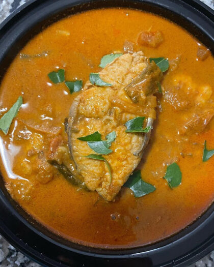 Kingfish cooked with coconut, Shallot, and rampa leaf - red curry